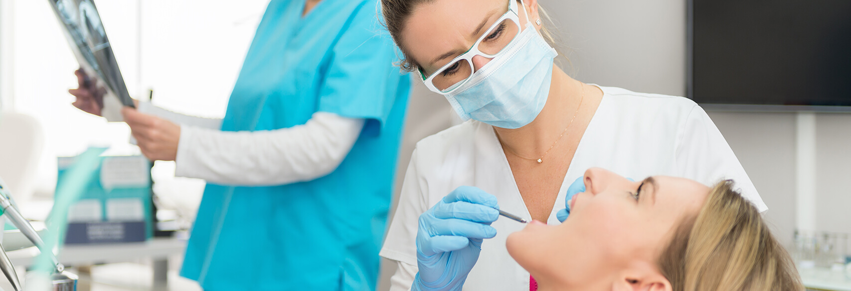 patient receiving a dental exam