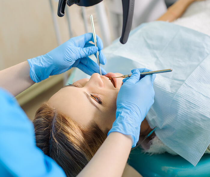 patient receiving a dental exam