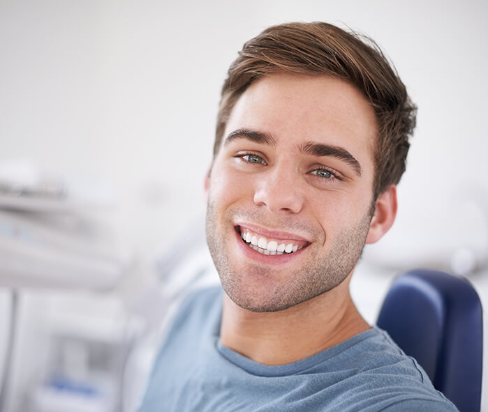 smiling man at the dentist