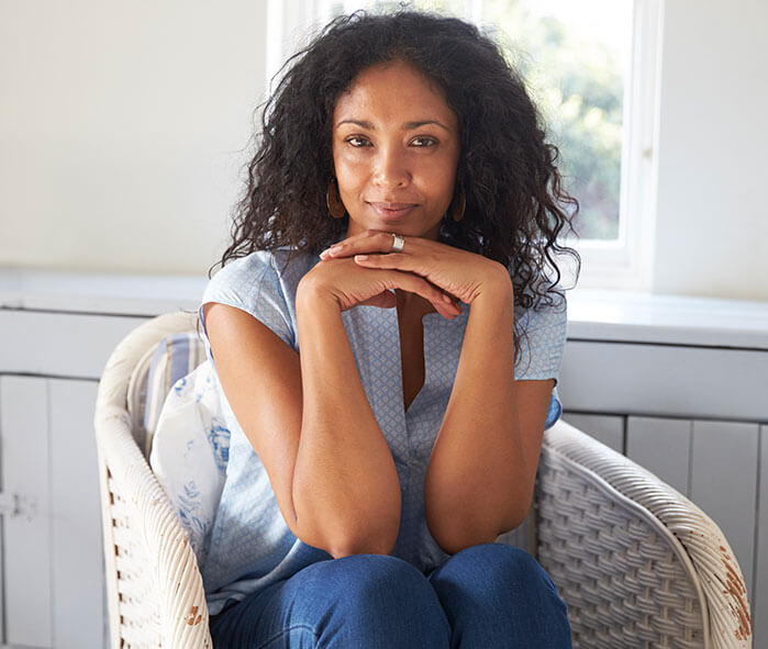 woman smiling slightly